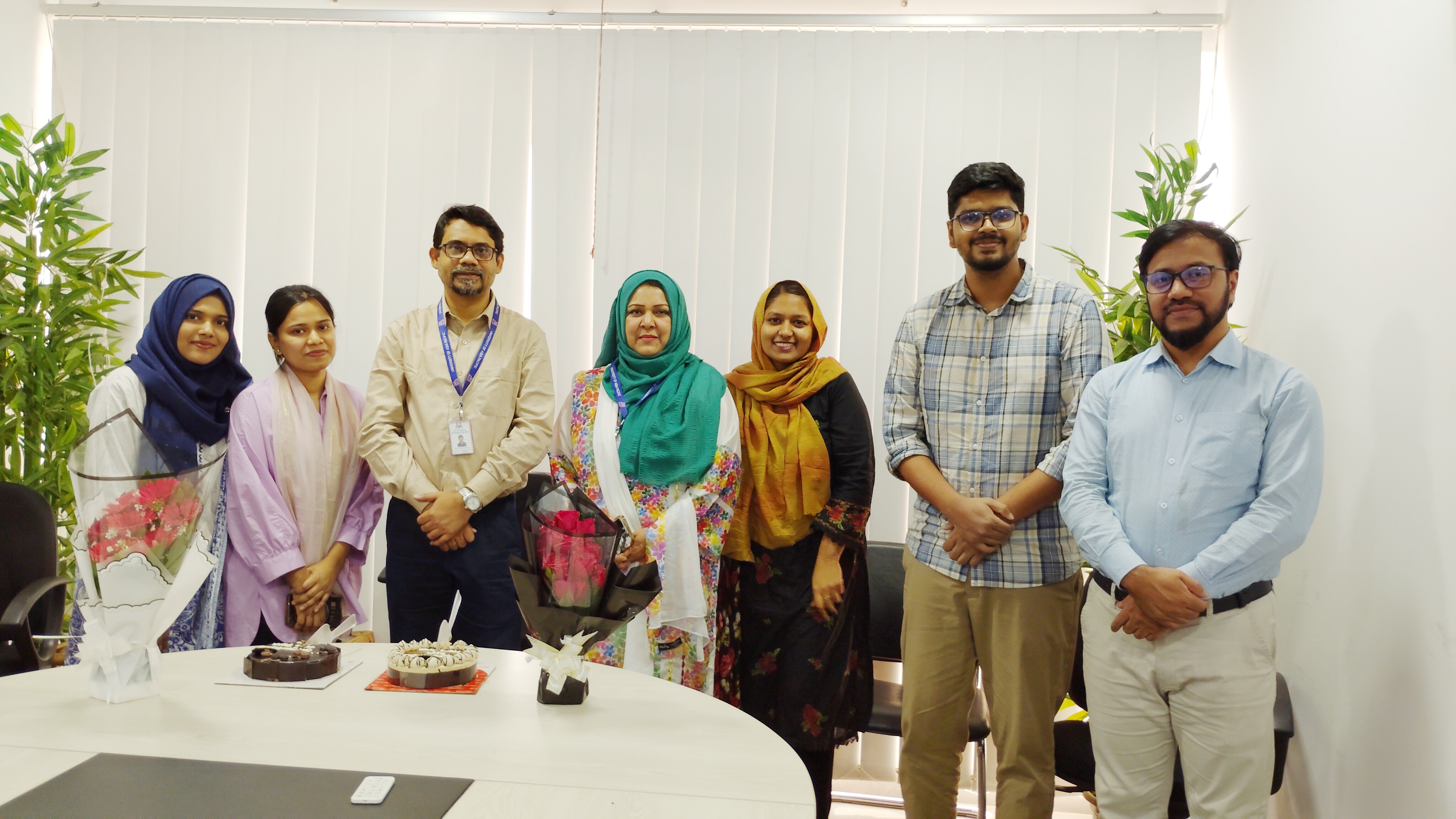 Thesis students celebrating faculty promotions