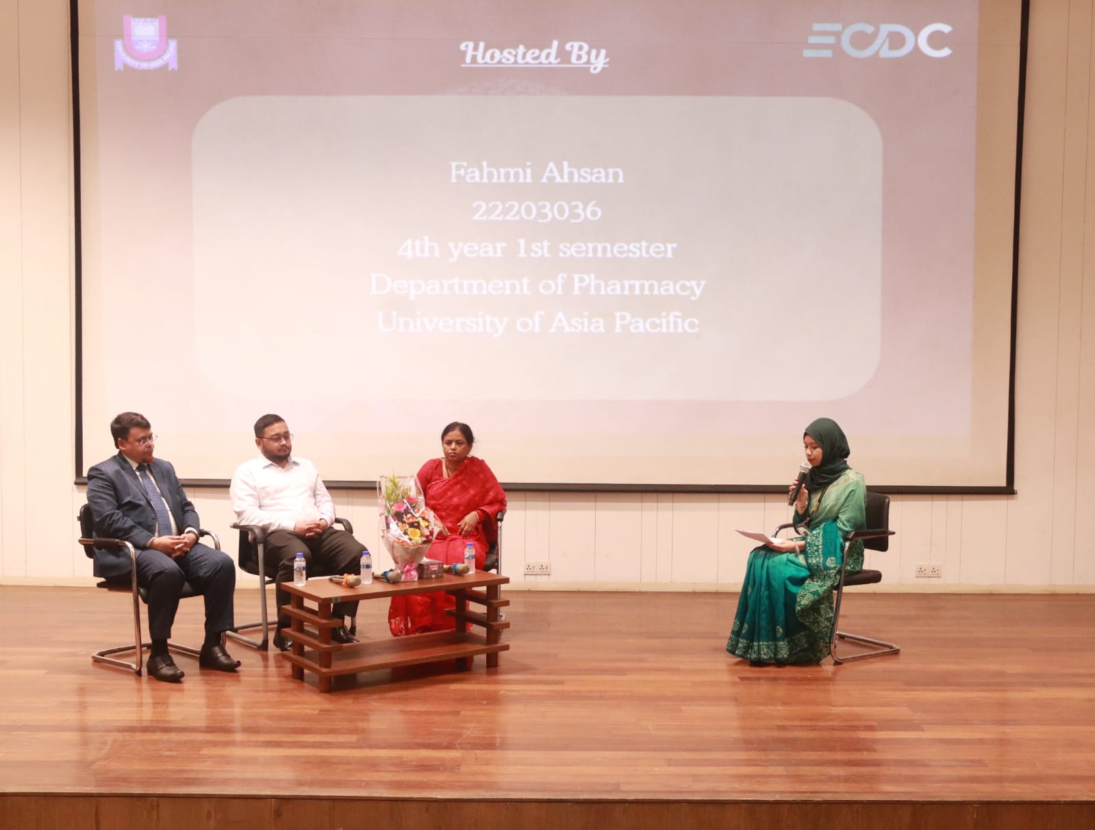 Distinguished panelists during the live podcast session